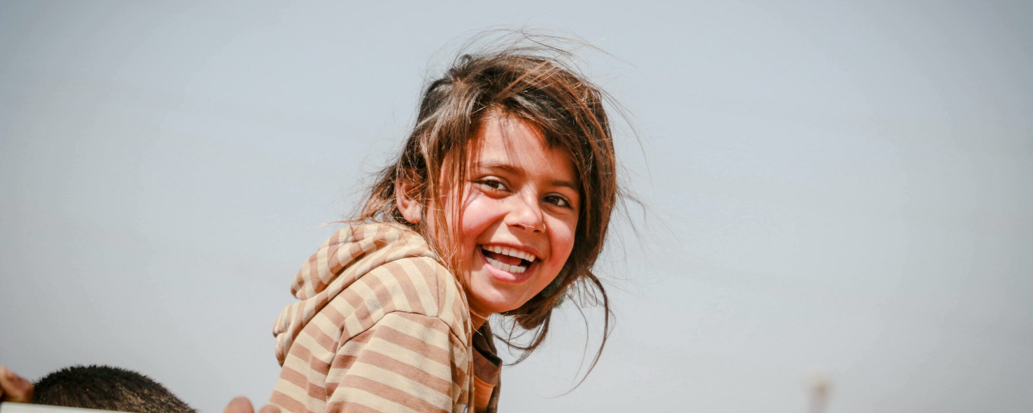 Child smiling.